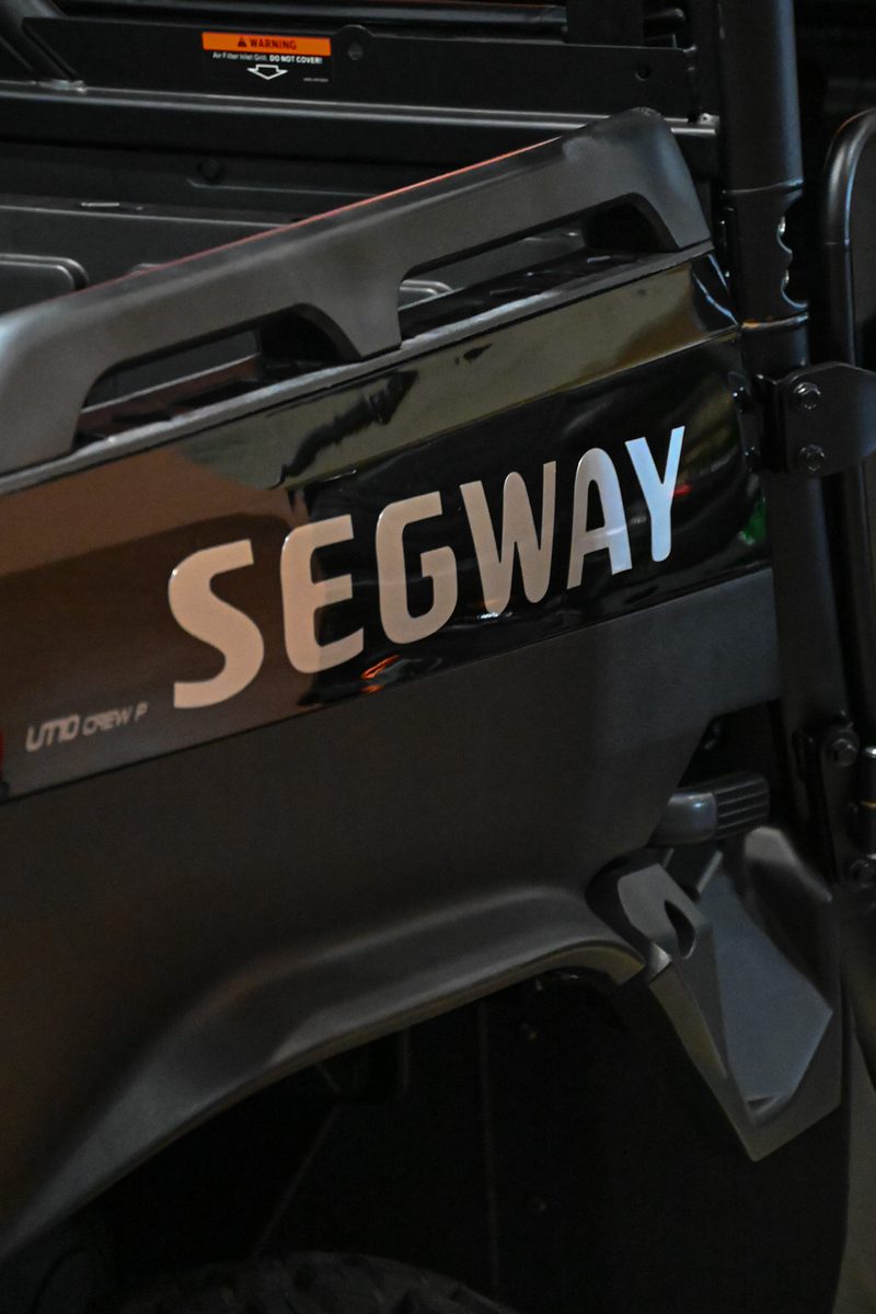 Detail shot of the Segway badge on the body panel of a side by side
